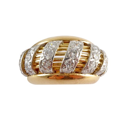 Gold and diamond bombe and wirework ring by Cartier, Paris,